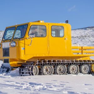 a truck is parked in the snow