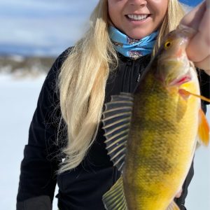 a person holding a fish