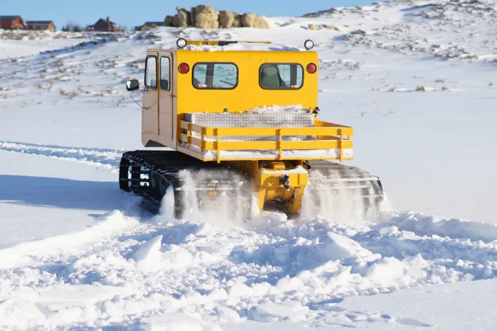 a truck that is sitting in the snow